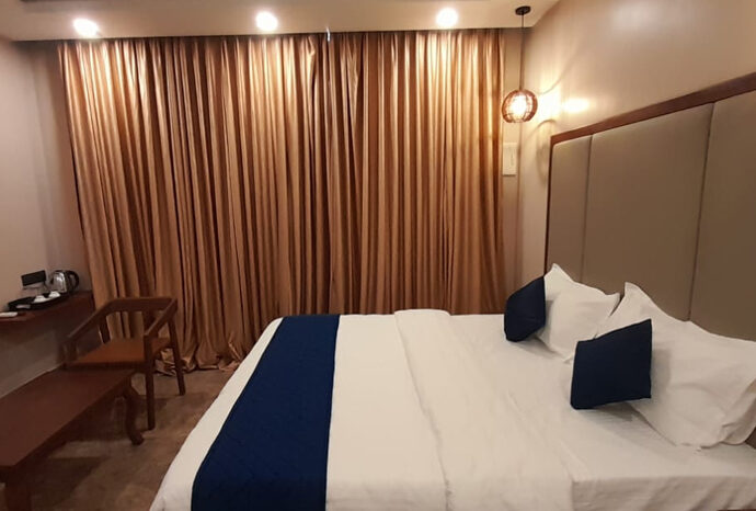 Spacious family suite with balcony overlooking Pondicherry Beach